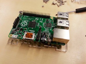 Attach the Raspberry Pi B+ to the case.